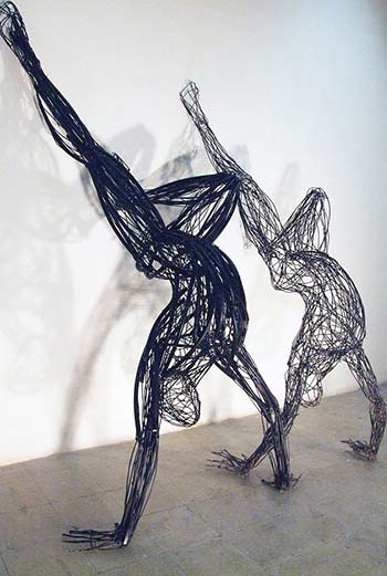 Sculptures Of Energetic Human Figures