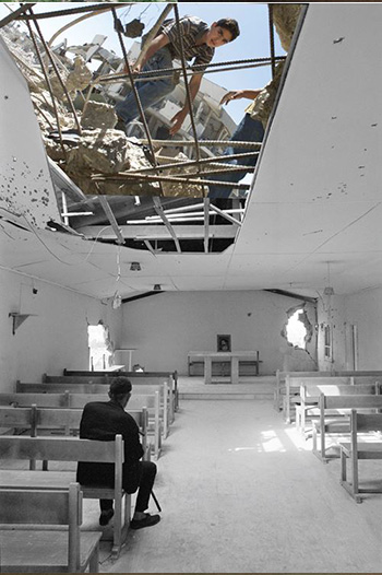 One of the few remaining refugees after the civil strife in Jisr el-Basha camp, passes a quiet moment in the partly damaged Pontifical Mission Church, Lebanon 1976.  UNRWA photo archive . Palestinian Presidential Headquarters (al-Muqat’a), Ramallah 2002.  by Jamal Arouri
