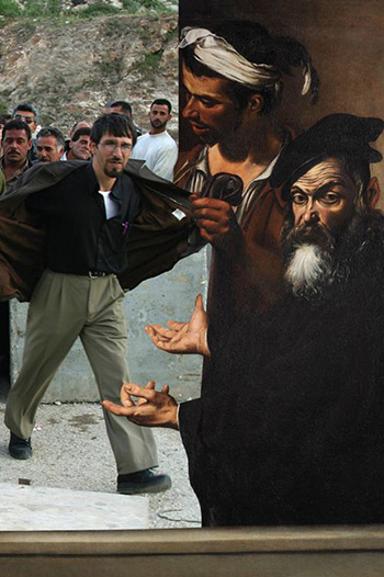 Ecce Homo (c. 1605)  Michelangelo Merisi Caravaggio “Ecce homo!“ John 19:5. photo: Palestinians crossing Qalandiya checkpoint on their way to Jerusalem. 20 Apr. 2002  by Alexandra Boulat