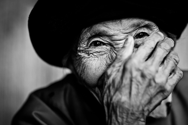 Bai Wu, Yunnan, China. Magdalena Strakova, Czech Republic. Highly Commended, Travel Portfolio, Travel Photographer of the Year 2018. (I was roaming the back alleys of the tiny village and discovered this charming old lady). (Photo: Magdalena Strakova/www.tpoty.com)