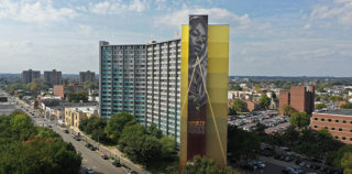 Faith XLVII - The Silent Watcher, Mural Arts Program / Faith XLVII, 3901 Market Street, Philadelphia. photo credit: Chop 'Em Down Films. Faith XLVII – The Silent Watcher
