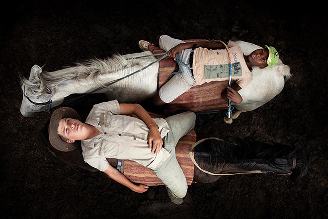 © Coenraad Heinz Torlage, South Africa, Student Photographer of the Year, Student Competition, 2021 Sony World Photography Awards. Image Name: HW and Olwethu after a long day herding cattle on horses. Series Name: Our Time.