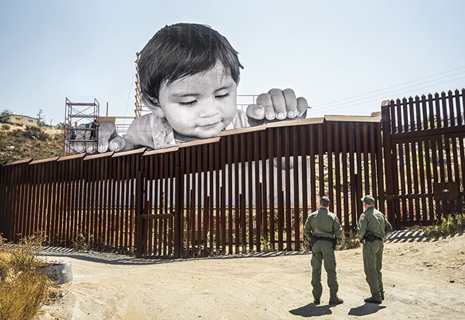 JR - GIANTS project - Kikito and the Border Patrol, Tecate, Mexico - U.S.A., 2017