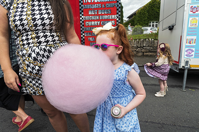 Joseph-Philippe Bevillard (Ireland) - Pink Cotton Candy, Borris Fair, Carlow, Ireland 2019. Series: Irish Travellers. 3rd place winner: AAP Magazine #22: Streets.