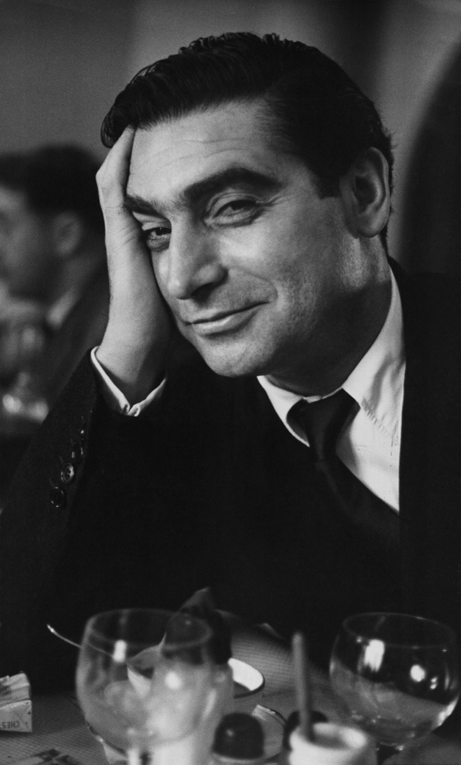 Robert Capa photographed by Ruth Orkin. Paris, France, 1951. ©Ruth Orkin, courtesy Magnum Photos
