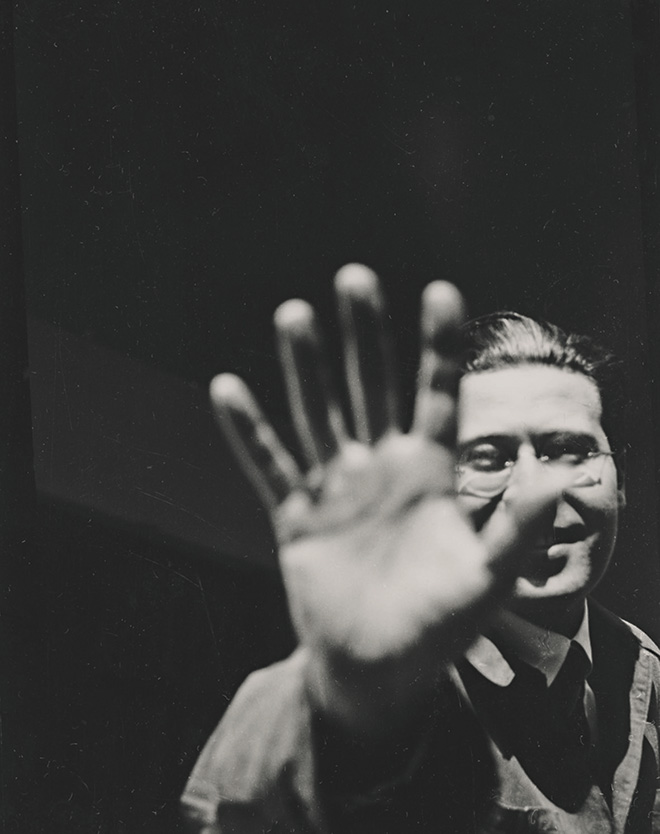 László Moholy-Nagy, Lucia Moholy. Untitled (Portrait of László Moholy-Nagy), 1925 Gelatin silver print, 9.3 x 6.3 cm, The Museum of Modern Art, New York, Thomas Walther Collection. The Family of Man Fund © 2021 Artists Rights Society (ARS), New York / VG Bild-Kunst, Bonn, Digital Image © 2021 The Museum of Modern Art, New York.