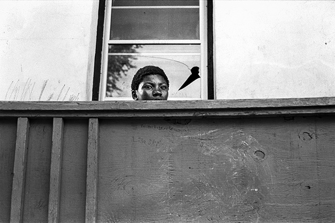 Prescott Lassman (United States) - Woman On A Porch, Series: Reflections In a Broken Window. Merit gallery AAP Magazine #25 B&W.