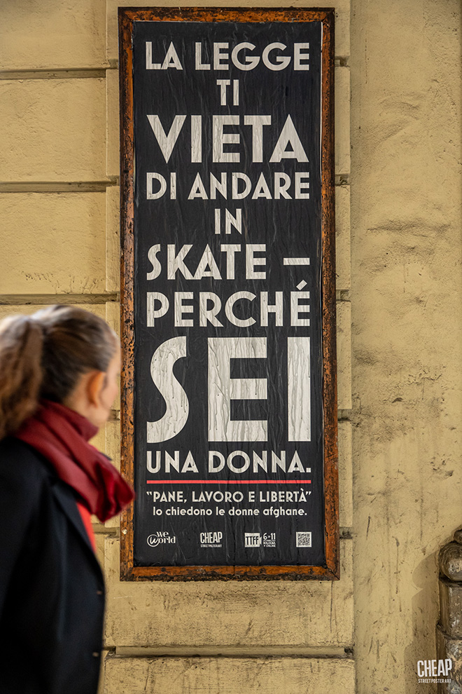 WeWorld e CHEAP Street Poster Art - Pane, lavoro e libertà, Bologna, 2022. Photo credit: Margherita Caprilli