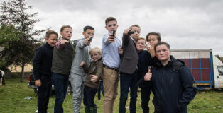 Carlo Bevilacqua - Young Travellers with toy guns at Ballinasloe Horse Fair (IE), 2022. Fine Art Giclée Print On Cotton Archival Paper, 70 x 50