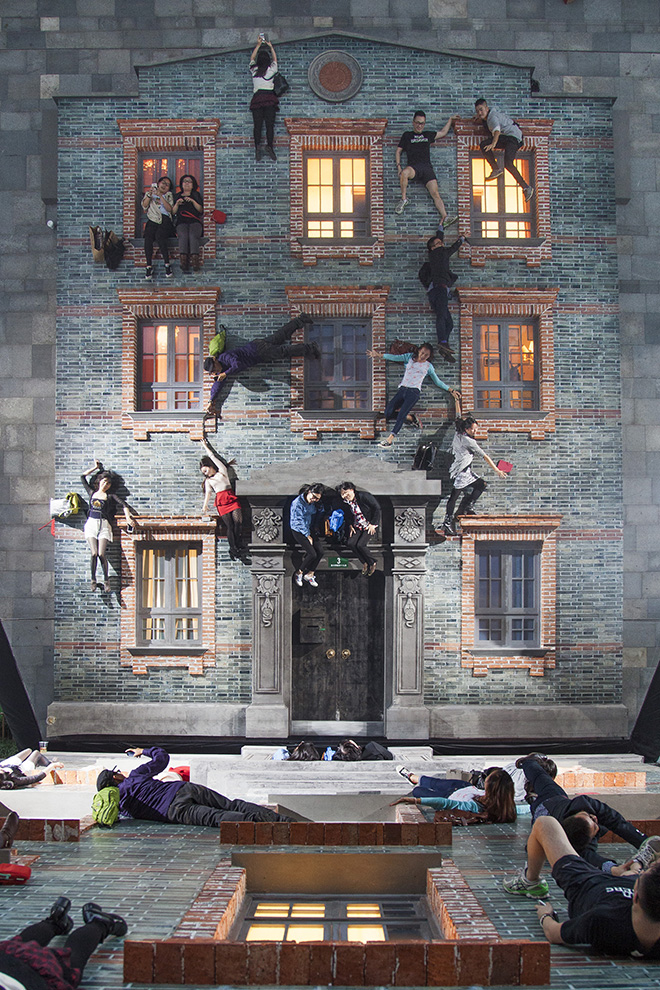 Leandro Erlich - Shikumen (2004). A building facade laid flat under a mirror suspended at a 45-degree angle. Dimensions variable. Fourteen different facades each specific to the city that hosted the temporary installation