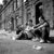 Toby Binder (Germany) - Belfast, Shankill. Girls sitting on the sidewalk of Tennent Street. Series: Wee Mcukers – Youth of Belfast. 1st Place Winner: AAP Magazine #36: Street.