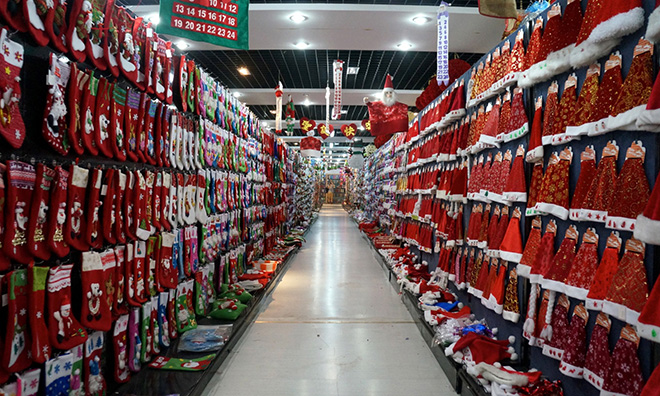 Santa hats galore … inside one of Yiwu’s Christmas showrooms. Photograph: Dan Williams/Unknown Fields