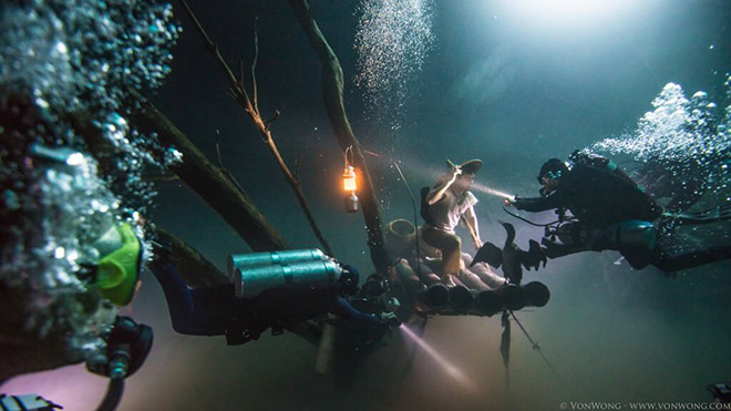 Benjamin Von Wong - Underwater River, Portrait of a Cormorant Fisherman 30m Underwater