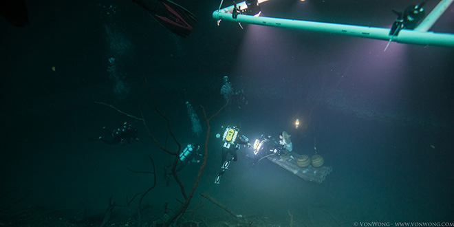 Benjamin Von Wong - Underwater River, Portrait of a Cormorant Fisherman 30m Underwater