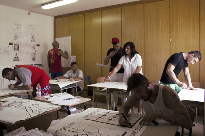 Guerrilla Spam - MANI IN ALTO!, Primo murales, Laboratorio Poster Art, Progetto di arte urbana Casa Circondariale di Larino (CB), 2017