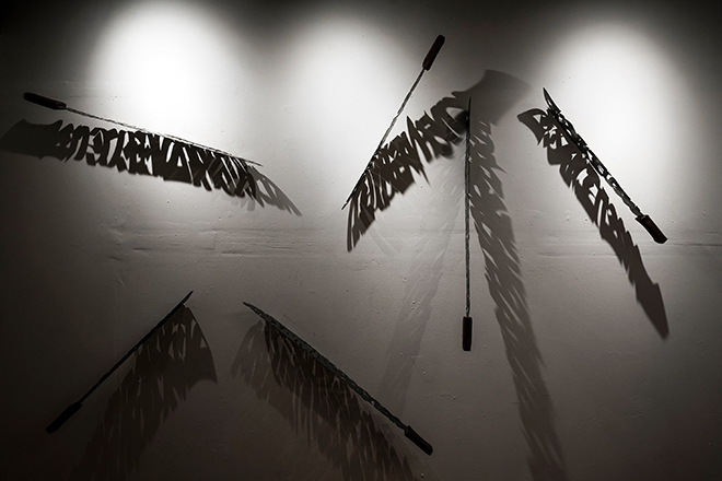 Said Dokins @saidokins, Long Live the Clandestine Peasant Revolutionary Forces, 2019. Detail. Installation of 6 machetes with laser cut calligraphy. Photo: Leonardo Luna.