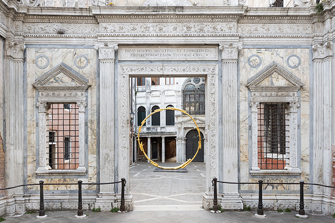 Ugo Rondinone - the sun II, 2018 Gilded bronze, 508 x 515.5 x 71 cm. Exhibition view: Ugo Rondinone, burn shine fly, Scuola Grande San Giovanni Evangelista, Venice, 2022. Courtesy the artist; Galerie Eva Presenhuber, Zurich; Esther Schipper, Berlin; Sadie Coles HQ, London; Gladstone, New York; Kamel Mennour, Paris; Kukje Gallery, Seoul. Photo © Andrea Rossetti