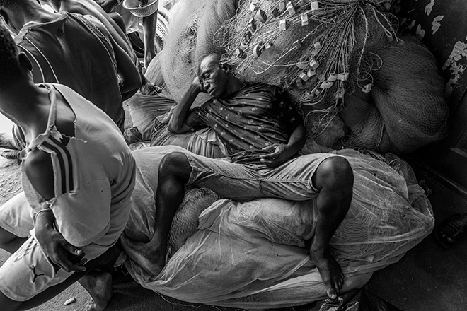 Rico X (United Arab Emirates) - The Stubborn Boys. From my series The Stubborn Boys fishermen in Gold Coast, Ghana. 2nd Place Winner: AAP Magazine #25 B&W.