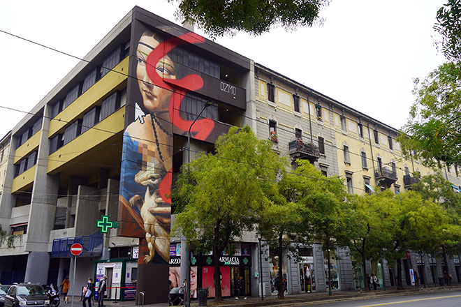 OZMO - A famous Milanese Renaissance Girl, with red brushstroke, pixels and a pointer, Milano. photo courtesy: Ozmo