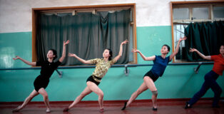 Song and dance troupe, China, 1979. © Eve Arnold / Magnum Photos