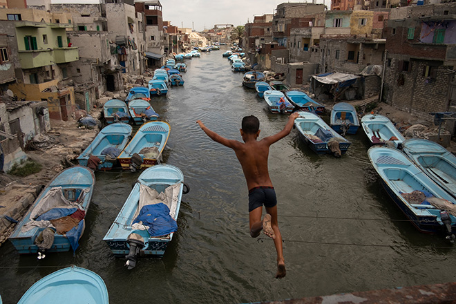 Title: Here, The Doors Don't Know Me. © Mohamed Mahdy. World Press Photo Open Format Award