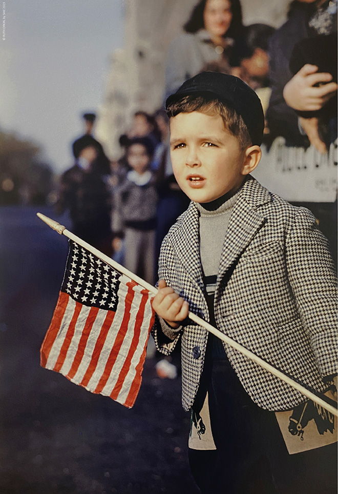 Ruth Orkin - Boy with flag, 1949. ©RUTH ORKIN by SIAE, 2023