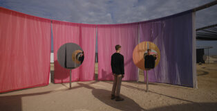 Your fivefold vanishing points, 2023. Galvanised steel, textile (white, yellow, orange, light red, red, purple, violet), solar lamp, mirror, stainless steel. 380 x 950 x 950 cm. Installation view: Olafur Eliasson: The curious desert, near the Al Thakhira Mangrove in Northern Qatar, 2023. Photo: Ander Sune Berg. Courtesy of the artist; neugerriemschneider, Berlin; Tanya Bonakdar Gallery, New York / Los Angeles.