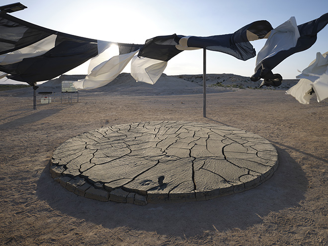 Your glacial-dust garden, 2023. Galvanized steel, textile (white, anthracite), solar lamp, glacial rock flour, 380 x 950 x 950 cm. Installation view: Olafur Eliasson: The curious desert, near the Al Thakhira Mangrove in Northern Qatar, 2023. Photo: Anders Sune Berg. Courtesy of the artist; neugerriemschneider, Berlin; Tanya Bonakdar Gallery, New York / Los Angeles.