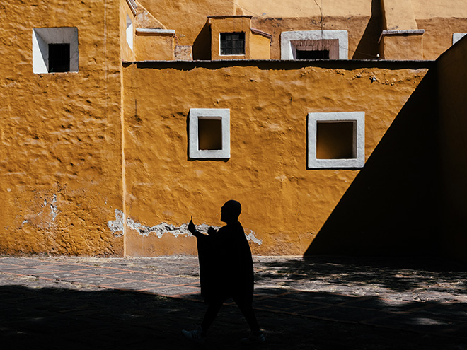 Federico Borobio (Argentina) - The mysterious man of the Chapel of Santa Catarina. Series: Patitas Machucadas Tour (Worn Out Paws Tour). Merit Gallery,  AAP Magazine #36: Street.