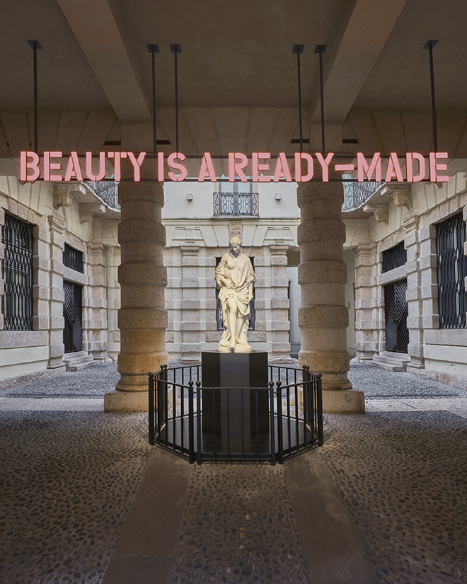 Claire Fontaine  (Collettivo - Parigi, 2004)  - Beauty is a ready made, 2024, Lettere a LED tridimensionali, struttura e supporto. Alessandro Puttinati, La Bagnante, 1846, Marmo di Carrara, Verona, Palazzo Maffei Casa Museo. Photo: Andrea Pugiotto.