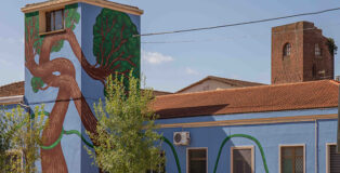 Nian - Innesto, murale a cura di Street Levels Gallery presso Istituto Comprensivo Giorgio La Pira Piazza della Costituzione, San Donnino Campi Bisenzio (FI)