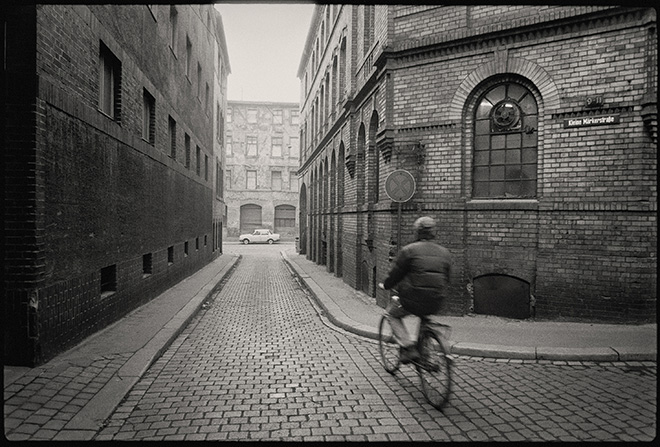 Henk Kosche - Cyclist_November, 1988. Street Photography At The End Of The 80s. Courtesy of: All About Photo