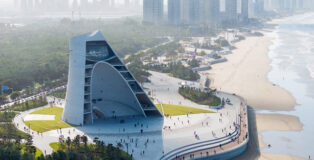 OPEN Architecture - Sun Tower, Yantai, China. Sun Tower between sea and city. Photo credit: Iwan Baan