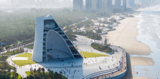 OPEN Architecture - Sun Tower, Yantai, China. Sun Tower between sea and city. Photo credit: Iwan Baan OPEN Architecture – Sun Tower, Yantai, China