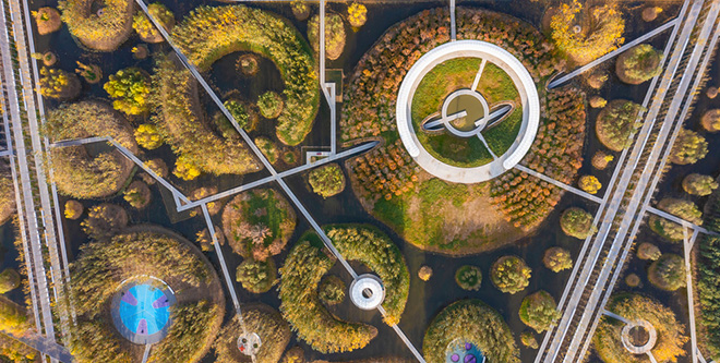 Turenscape - The Huaiyang Fuxi Cultural Park, Henan, China. Sports ground and art installations in small craters add to park's interactive charm. Photo credit: Turenscape Turenscape - The Huaiyang Fuxi Cultural Park, Henan, China. Sports ground and art installations in small craters add to park's interactive charm. Photo credit: Turenscape