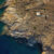 Aerial view of Horizon House nestled into the rocky coastline of Syros.. Photo credit: ONUS Architecture Studio