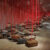 Shiota Chiharu, Accumulation - Searching for the Destination 2014/2019. Suitcase, motor and red rope. Dimensions variable. Installation view: Shiota Chiharu: The Soul Trembles, Mori Art Museum, Tokyo, 2019 Photo: Kioku Keizo. Photo courtesy: Mori Art Museum, Tokyo