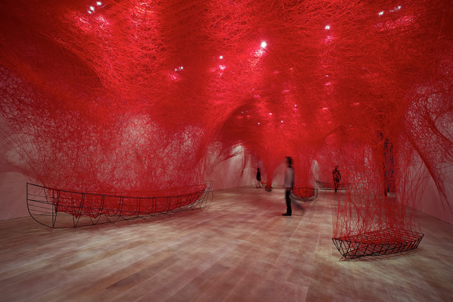 Shiota Chiharu, Uncertain Journey 2016/2019. Metal frame, red wool Dimensions variable. Installation view: Shiota Chiharu: The Soul Trembles, Mori Art Museum, Tokyo, 2019. Photo: Sunhi Mang. Photo courtesy: Mori Art Museum, Tokyo