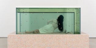 Ariana Papademetropoulos - Water Based Treatment, 2026, Fish tank, mattress and headphones 157 x 284 x 185 cm (61,81 x 111,81 x 72,83 in), Weight approx. 2,5t (full) (ARP 1023). © Ariana Papademetropoulos. Photos: Nicolas Brasseur. Courtesy Thaddaeus Ropac gallery, London · Paris · Salzburg · Milan · Seoul