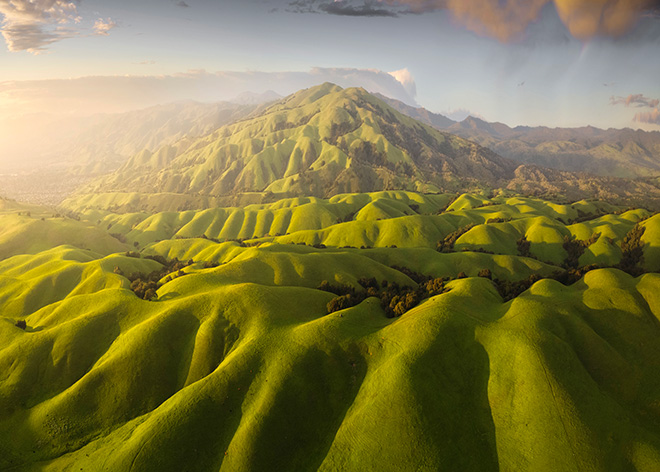 Emerald Waves at Dusk by Chengming Liu, United States / The 2nd International Aerial Photographer of the Year 2026 The Above Mountain Award Winner.