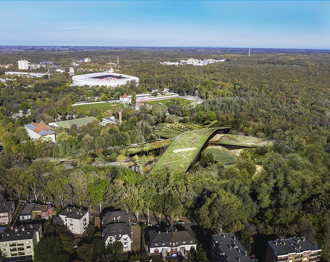 BJARKE INGELS GROUP, Vikar and, Lukacs Architecture Studio - The Hungarian Natural History Museum. The roof, covered with native plant species, extends the forest canopy naturally, encouraging the return of flora and fauna to an area that was once an integral part of the city’s forest. Photo credit: BIG